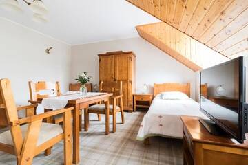 Фото номера Трехместный номер Отель Hotel Osada Karbówko Wellness &amp; SPA г. Elgiszewo 4